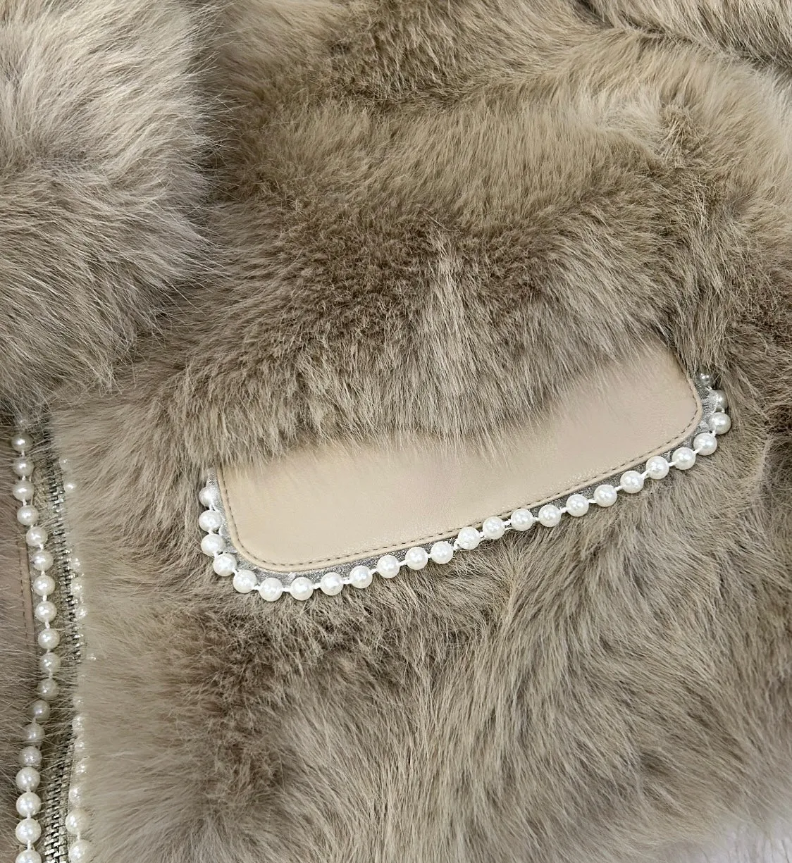 Beige fur coat